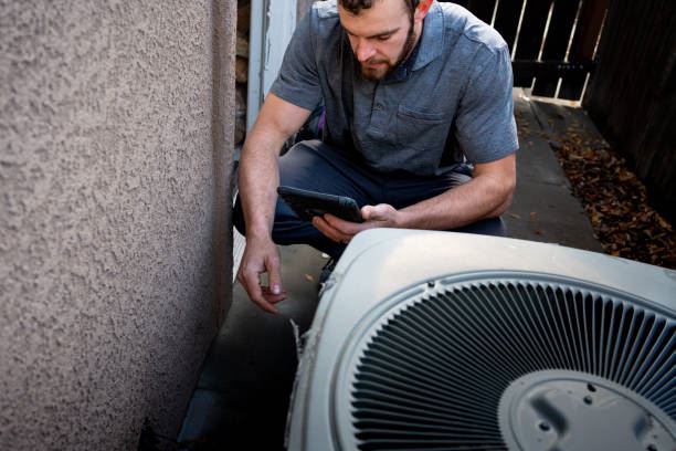 man working on HVAC